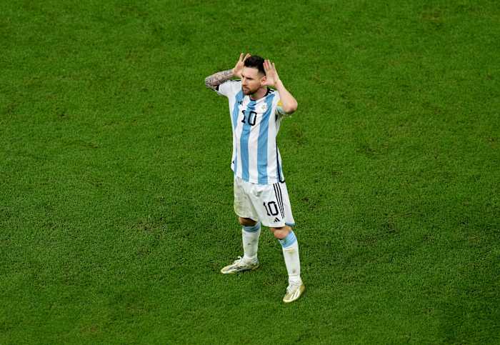 Lionel Messi pictured celebrating after scoring in Argentina's game against Holland at the 2022 FIFA World Cup